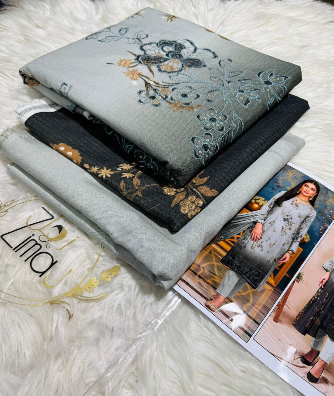 Zimal Collected                 ALLURE
FRONT FULLY Thread & Sequenc EMBROIDERED SHIRT
DAMAN Embroidered
Printed back & Sleeves
Slub Karandi Printed SHAWL
DYED Karandi Trouser