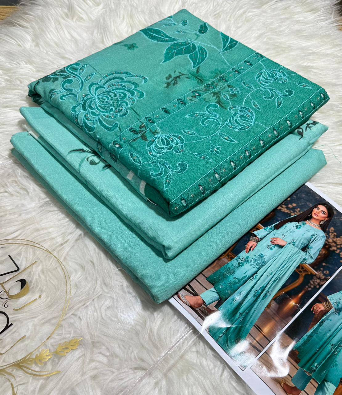 Zimal Collected                 ALLURE
FRONT FULLY Thread & Sequenc EMBROIDERED SHIRT
DAMAN Embroidered
Printed back & Sleeves
Slub Karandi Printed SHAWL
DYED Karandi Trouser