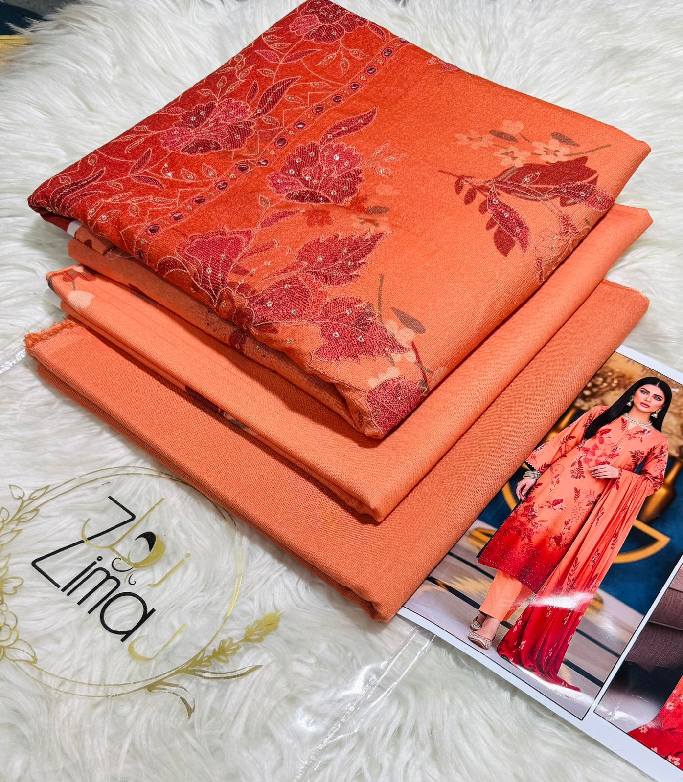 Zimal Collected                 ALLURE
FRONT FULLY Thread & Sequenc EMBROIDERED SHIRT
DAMAN Embroidered
Printed back & Sleeves
Slub Karandi Printed SHAWL
DYED Karandi Trouser